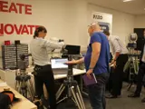 A man having his hand scanned