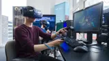 A man wearing a VR headset playing a video game